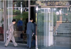 Sakura Bank employees report to work as usual